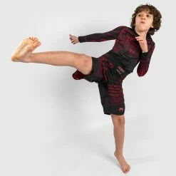 Venum Nakahi Kids Rashguard - Long Sleeves - Black/Red -Cheap Boxing Store 2 252Fe 252F0 252Fa 252F2e0a47a48e8baff98a79db9f148c9ec37c00e33c FS NAKAHI BLACK RED 01 c76d38f3 8b52 4511 805b 79ea6bb145e8