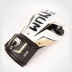 Venum Elite Evo Boxing Gloves - White/Gold 11 Venum Elite Evo Boxing Gloves - White/Gold -Cheap Boxing Store b 252F2 252F6 252Fc 252Fb26c5613dde164e73bfe4370d2237062149beb4c BG ELITE EVO WHITE GOLD 04 04848d76 fb1d 4a1f 88e1 57466f2cf663